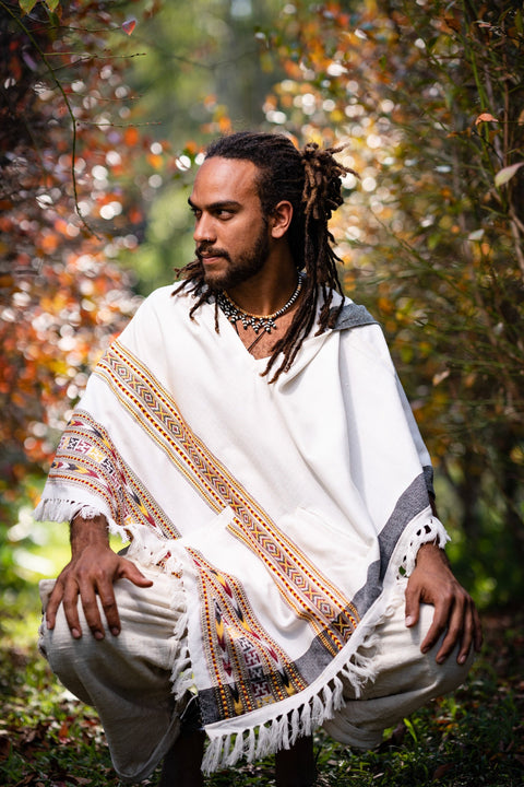 Stylish cashmere ponchos and wraps for men & women.