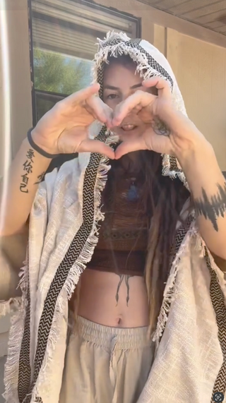 @thrifted.wolf is wearing WIZARD Womens Hooded Vest Kimono Beige Tribal Ritual Ceremony Shamanic Gypsy Festival Magic Ritual Alchemy Primitive Rave Boho Earthy AJJAYA