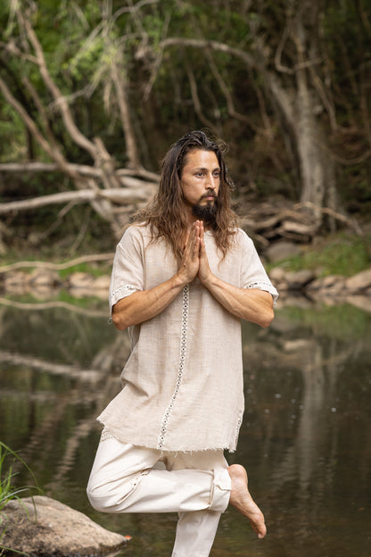 Our IKRAN cotton shirt is made of 100% natural breathable soft cotton. It is naturally dyed, and stone washed, has an open V-Neck design for maximal comfort and style and is decorated with tribal patterns.