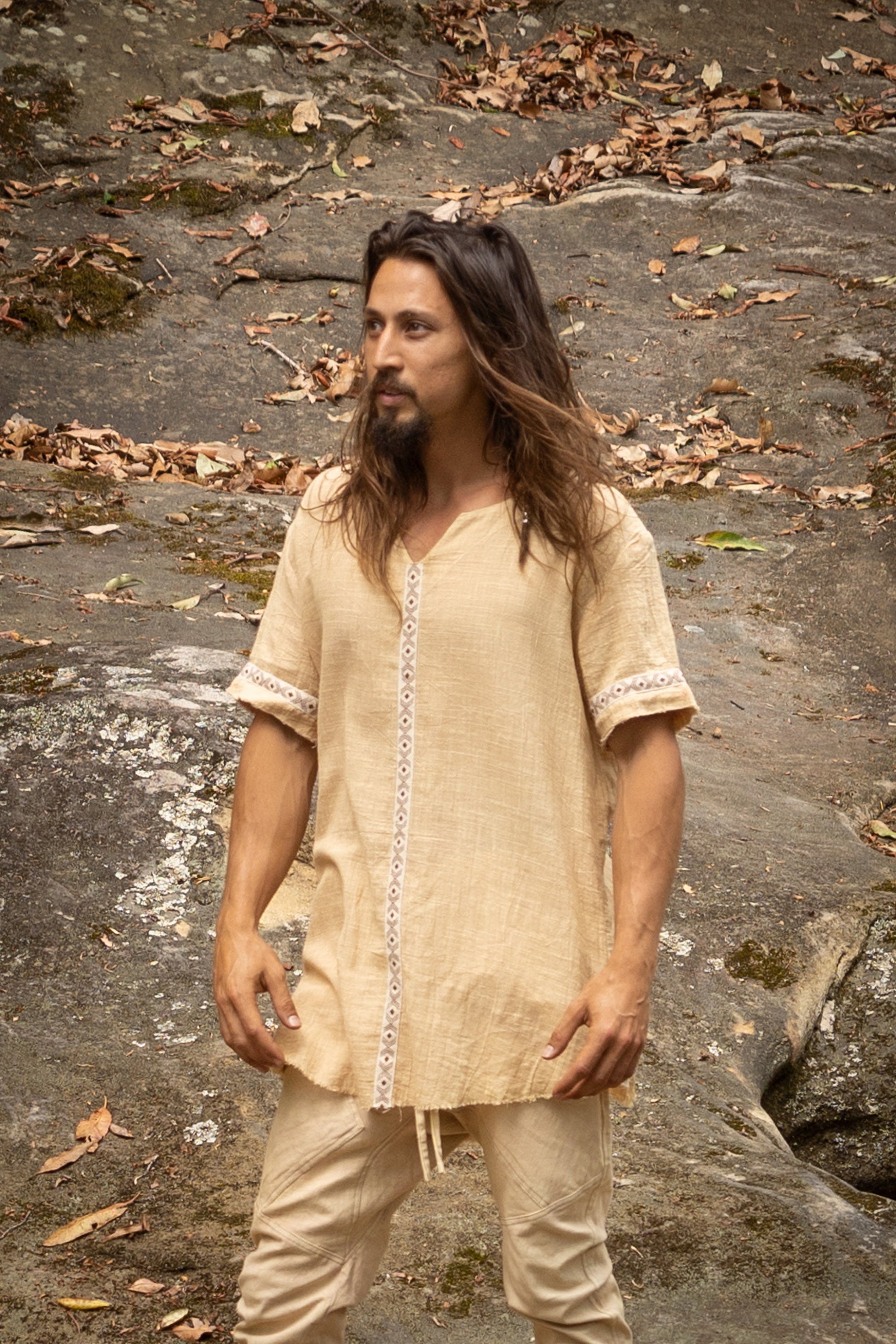Our IKRAN cotton shirt is made of 100% natural breathable soft cotton. It is naturally dyed, and stone washed, has an open V-Neck design for maximal comfort and style and is decorated with tribal patterns.