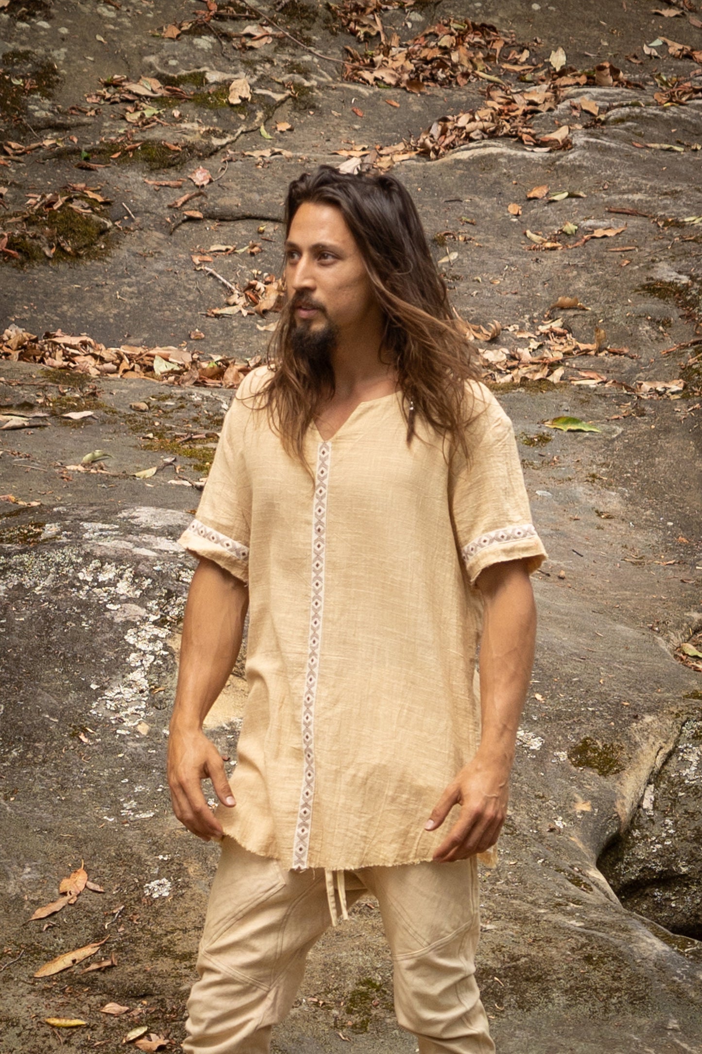 Our IKRAN cotton shirt is made of 100% natural breathable soft cotton. It is naturally dyed, and stone washed, has an open V-Neck design for maximal comfort and style and is decorated with tribal patterns.