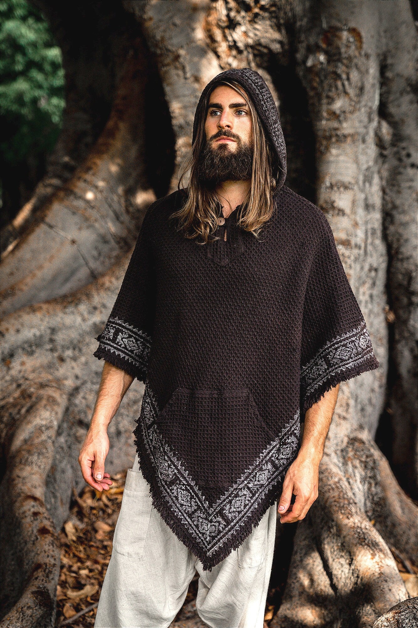 Our VECHO poncho is totally vegan! it is made of natural textured cotton and is decorated with block printed patterns . . .

It has a large hood and a V neck with a wooden button . . . 

Featuring 2 pockets and a large hood . . .