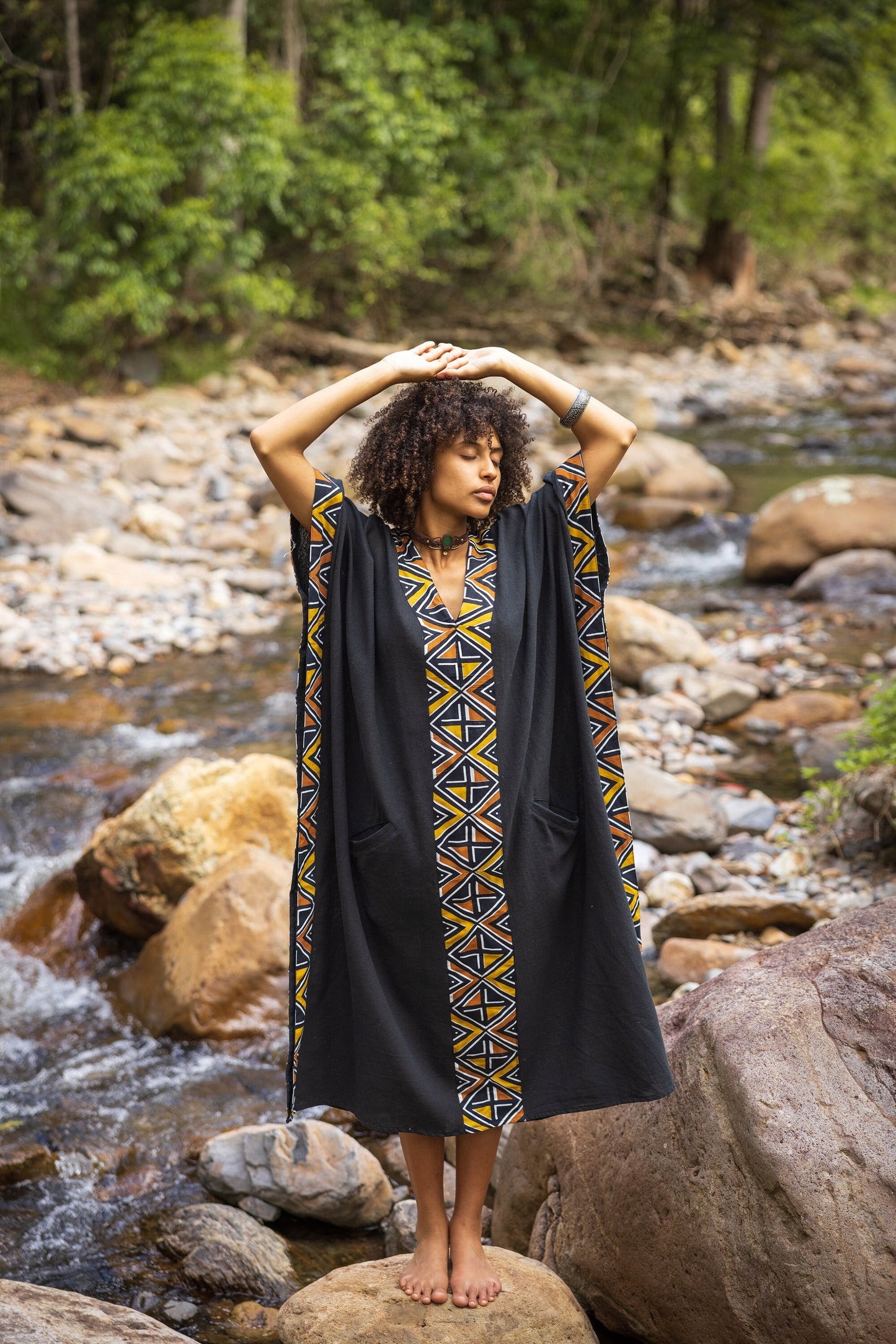Introducing our KAFATU stunning handmade African patterned Kaftan, the perfect choice for any ceremonial or ritual occasion. This beautiful piece features vibrant, bold colours and intricate African-inspired tribal patterns naturally dyed