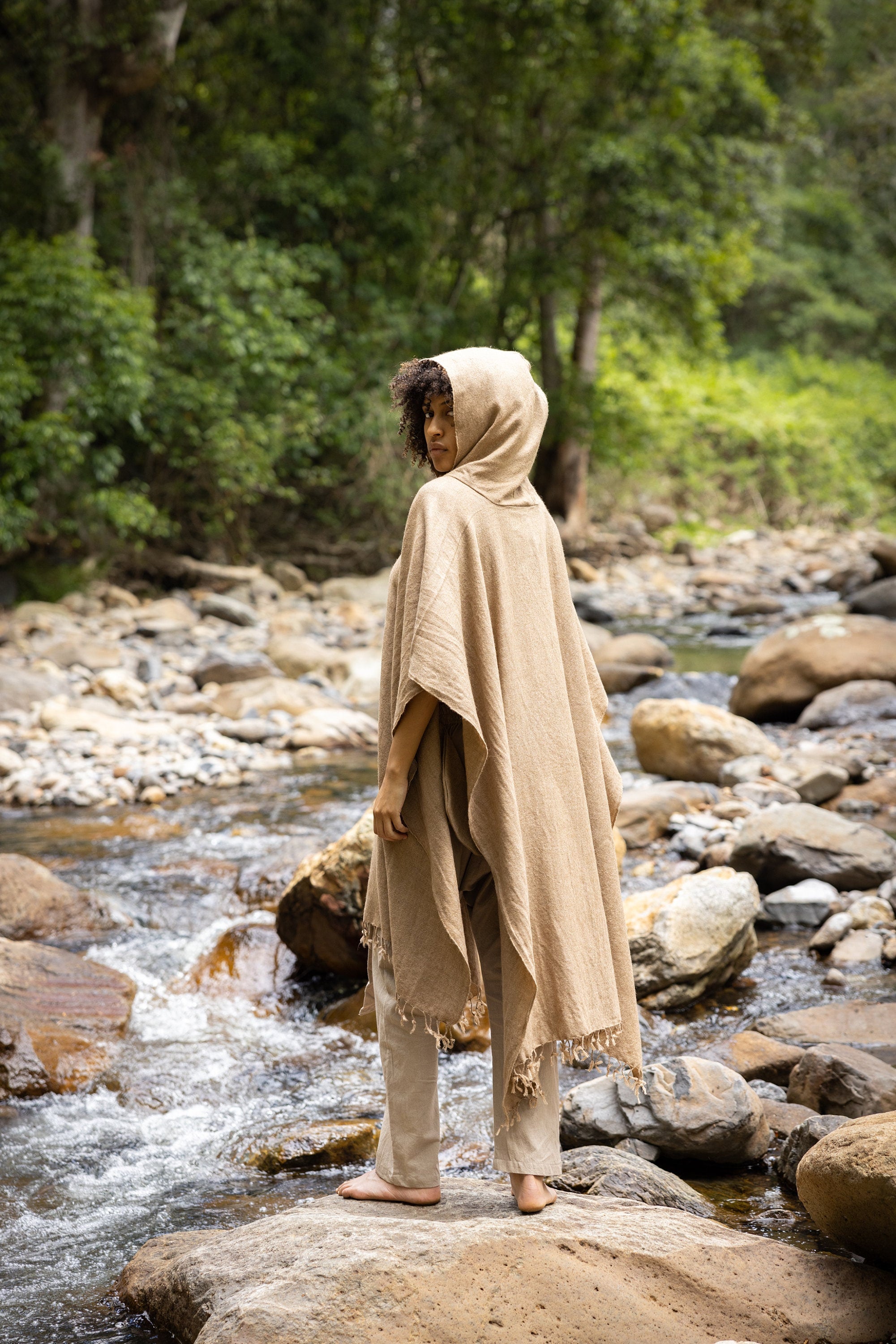 Our SAHAJI Poncho is carefully handwoven and made from 100% pure wool in an ancient traditional process without machinery, which makes every piece unique and personal.