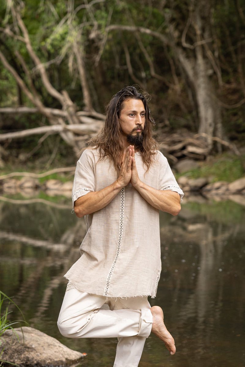 Our IKRAN cotton shirt is made of 100% natural breathable soft cotton. It is naturally dyed, and stone washed, has an open V-Neck design for maximal comfort and style and is decorated with tribal patterns.