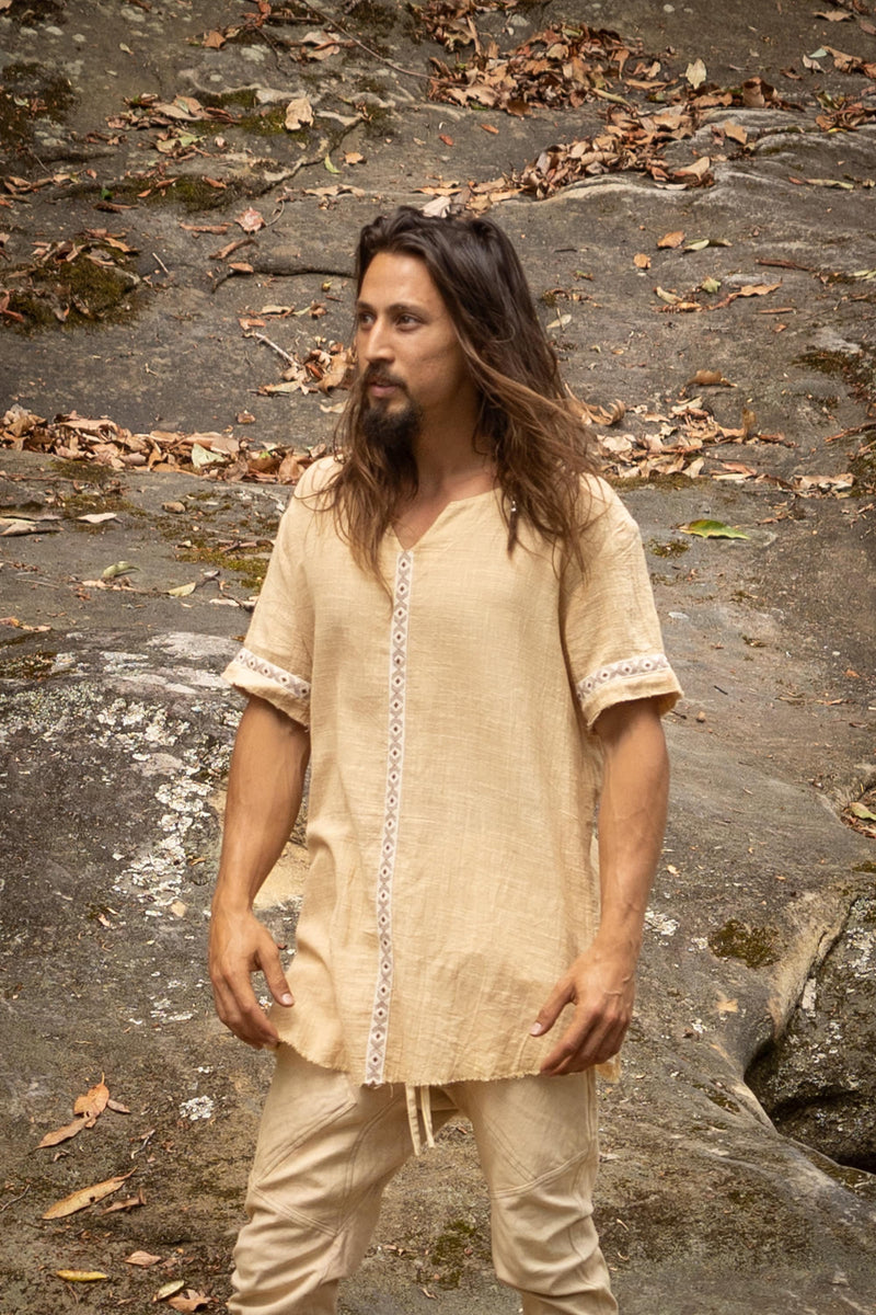 Our IKRAN cotton shirt is made of 100% natural breathable soft cotton. It is naturally dyed, and stone washed, has an open V-Neck design for maximal comfort and style and is decorated with tribal patterns.