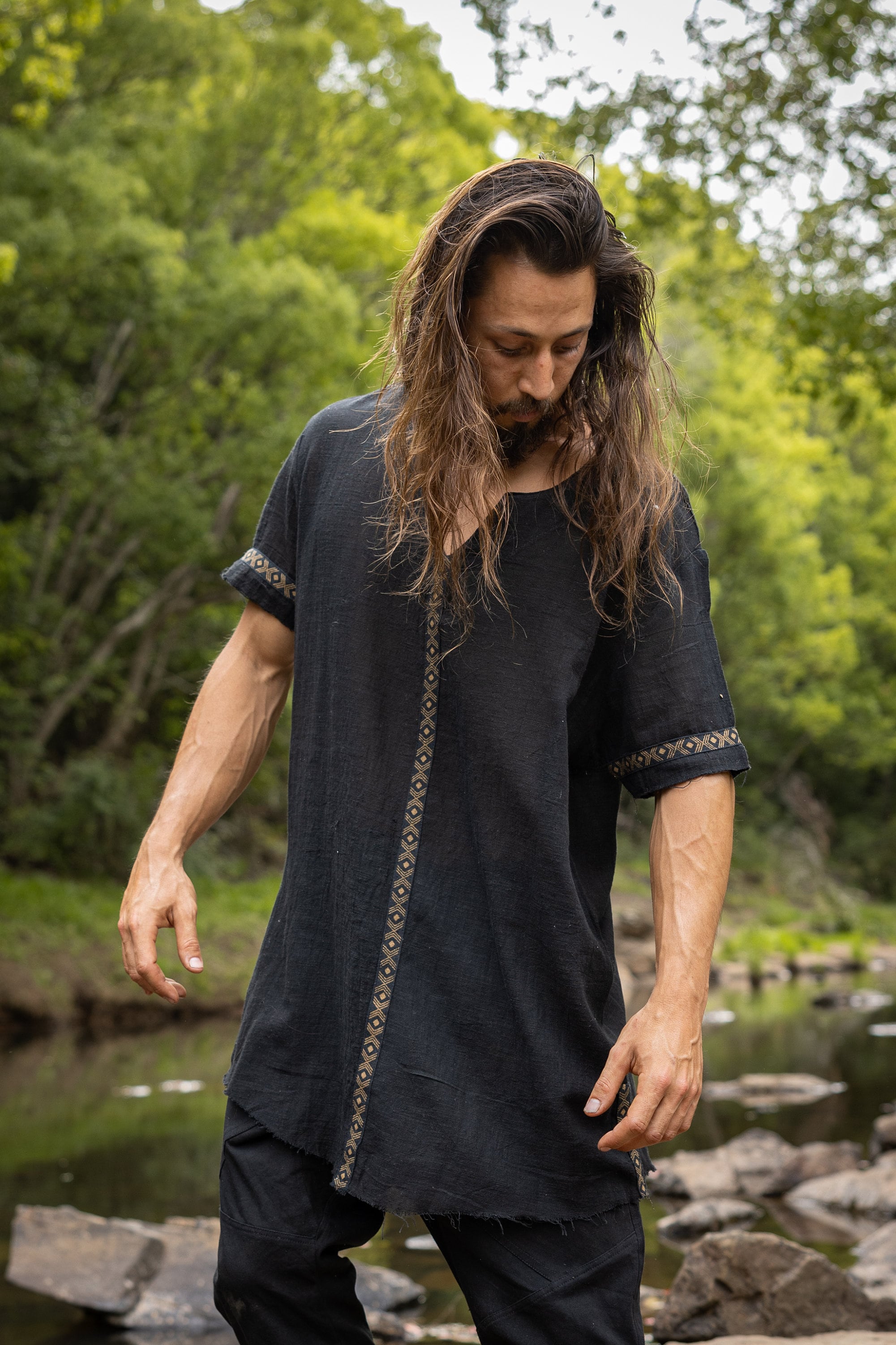 Our IKRAN cotton shirt is made of 100% natural breathable soft cotton. It is naturally dyed, and stone washed, has an open V-Neck design for maximal comfort and style and is decorated with tribal patterns.