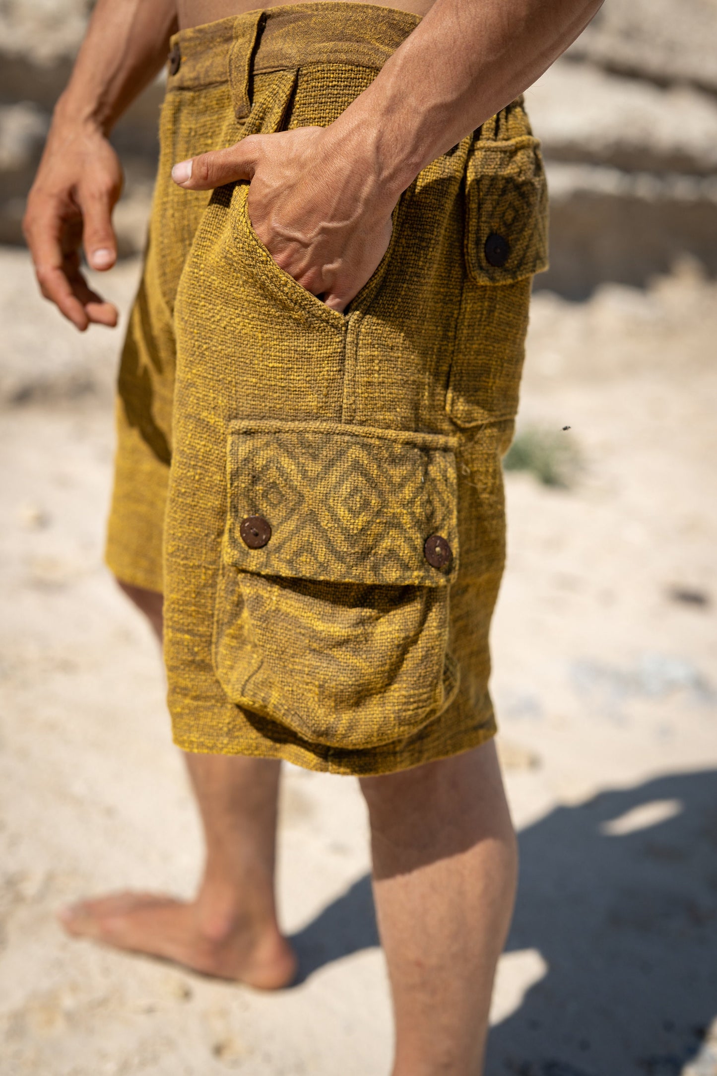 Our KORO pants are meticulously handmade using soft yet robust natural cotton, offering a breathable feel. The KORO Cargo Pants feature two front pockets, two side pockets, and two back pockets.